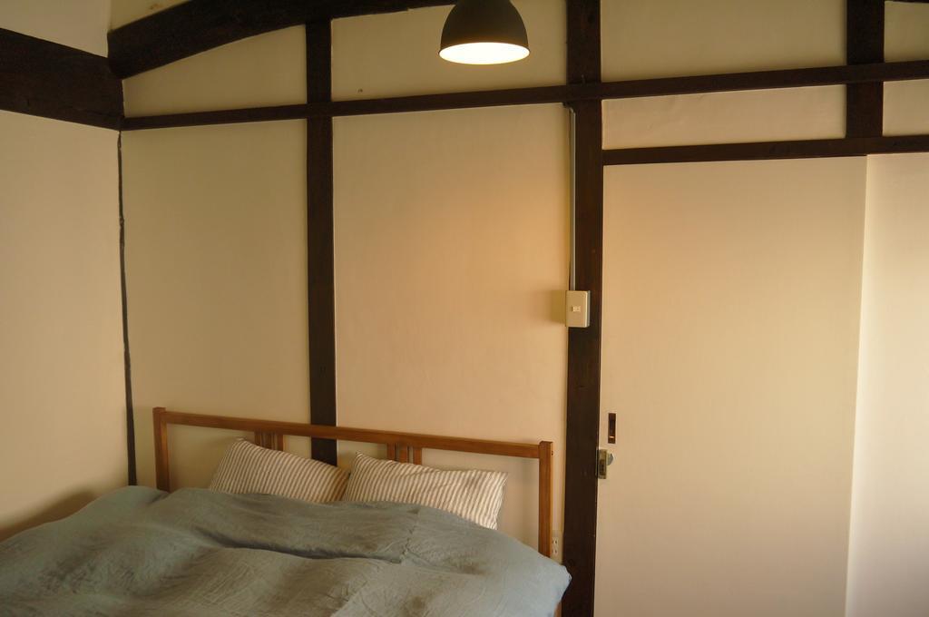Minatoya Guesthouse Iki Zimmer foto